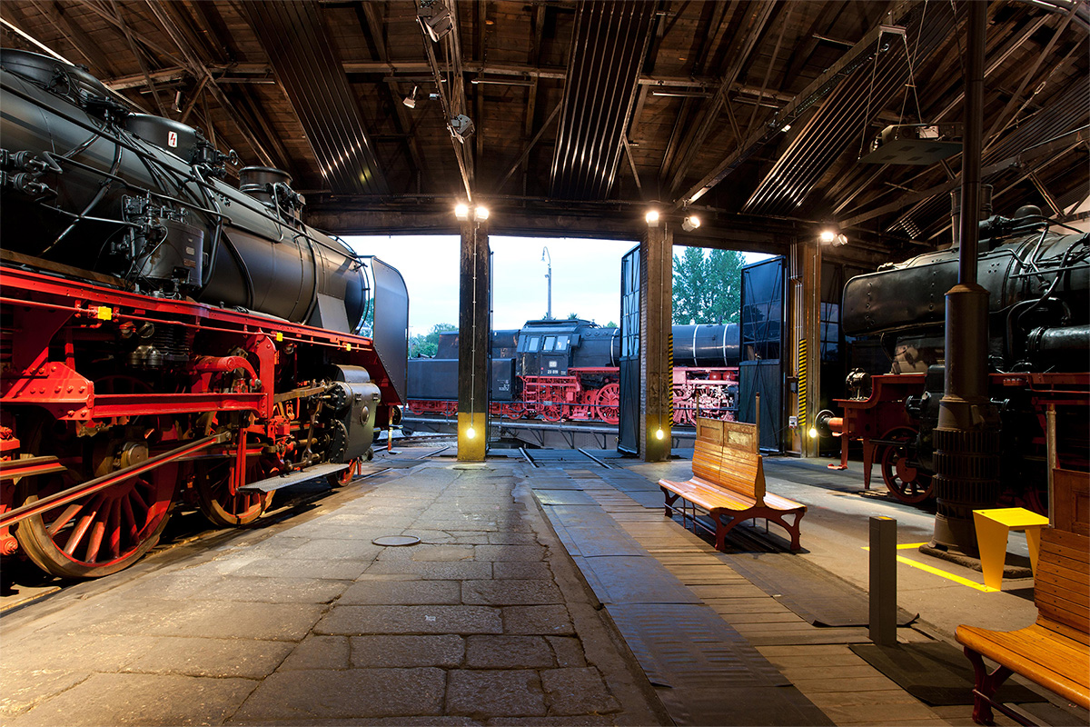 Inside view of the engine shed, the outside is visible through the gates